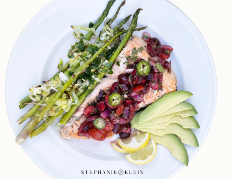Asparagus with capers and leeks beside grilled salmon with cherry salsa